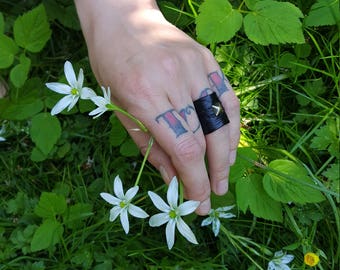 Kalopsia black metal studded vegan leather rings