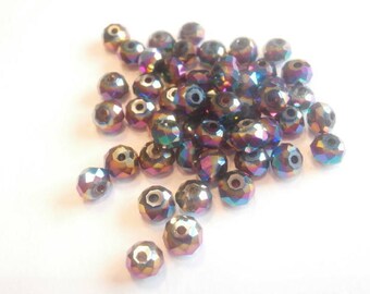50 multi color glass beads has 6 x 4 mm faceted