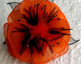 Orange silk flower brooch, feathers & beads