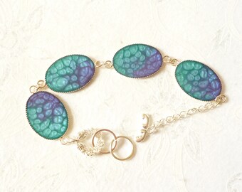 Bracelet 4 oval pellets shades of Blues, no. 6