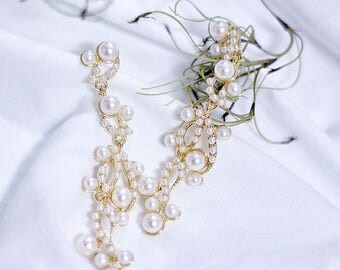 Ipaniel's Pi A Pat Pearl Wave earrings