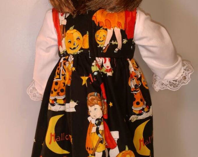 sleeveless dress in a vintage halloween print fits 18 inch dolls