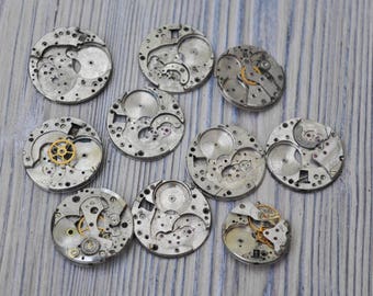 0.9 inch Set of 10 vintage wrist watch movements.