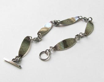 Sterling Silver Oval Plate-link Bracelet. Hammered Texture with Toggle Clasp. Hallmarked.
