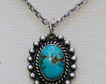Oval shaped Turquoise Southwestern Style Pendant
