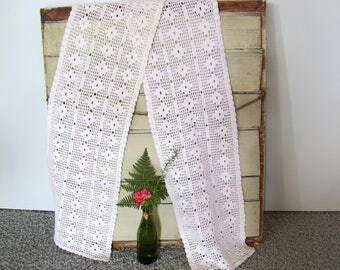 Long crochet runner 6'x10". Diamond pattern. White with a pink tone. Vintage.