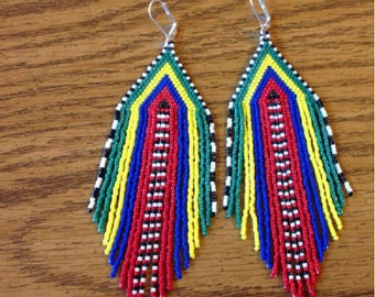 new my creation is handmade earrings woven Rainbow nine