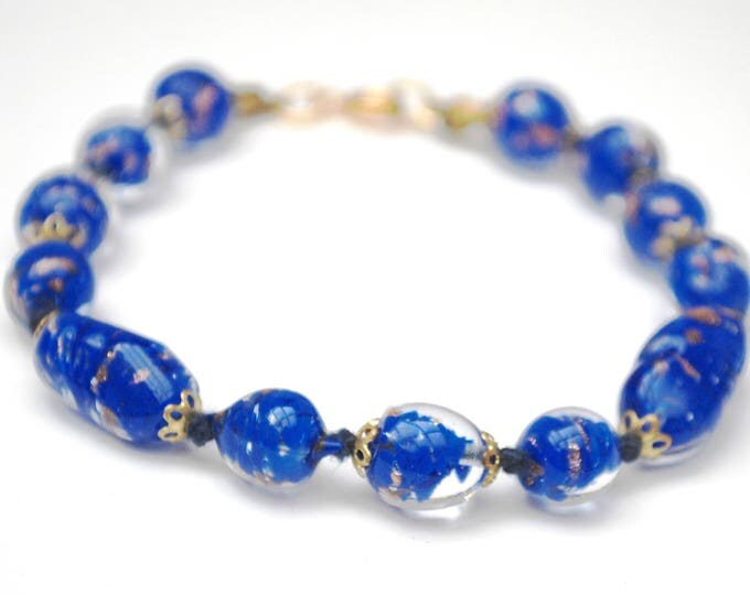 Italian Glass bead bracelet - Venetian clear and blue beads - gold sparkle - hand knotted - Art Glass