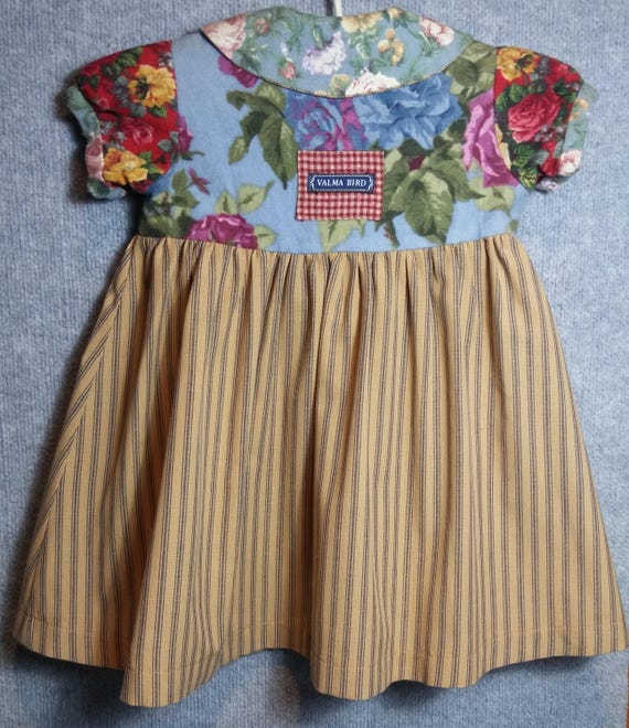 Little girls oldfashioned dress.