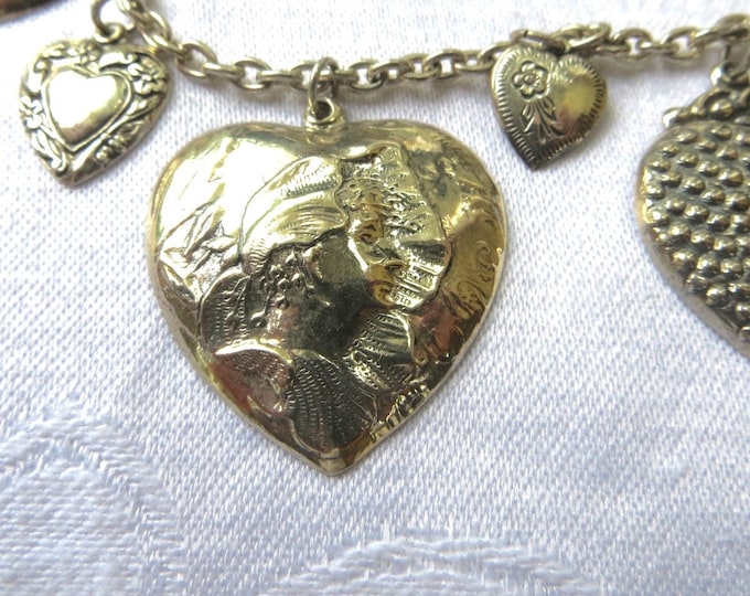 Sterling Heart Charm Bracelet, Nine Heart Charms, Raised Relief Detail, Vintage Charm Bracelet