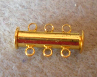 A golden tube clasp magnetic 3 holes 20 x 10 mm
