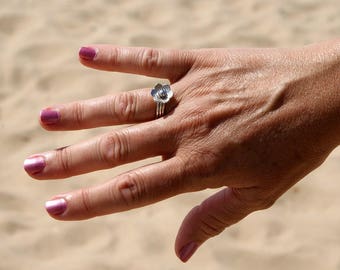 Trio of stacking rings with flower