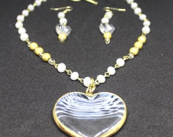 Necklace and earrings set with white rosary chain and stardust beads