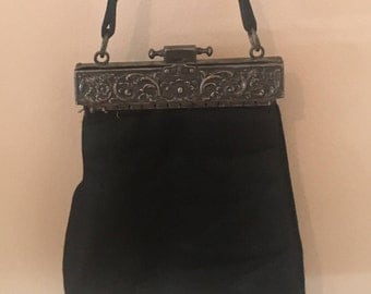 An antique Victorian bag or purse.