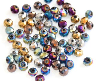 140 beads faceted Crystal blend color 6x5mm