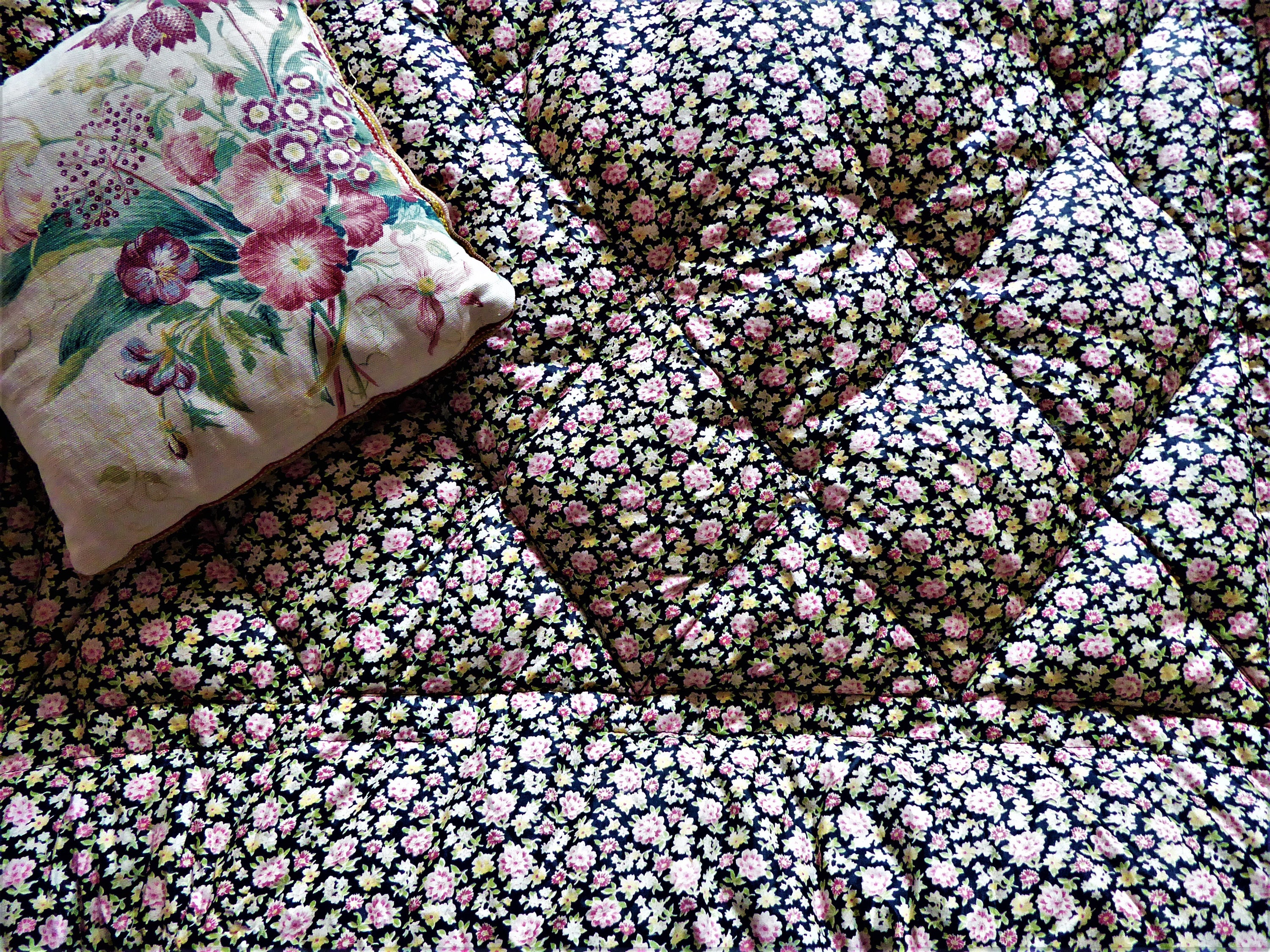 Vintage eiderdown feather quilt in pretty cottage floral