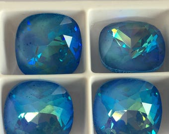 Lot de 4 cristaux Swarovski ultra ab cabochon 4470 12mm à sertir