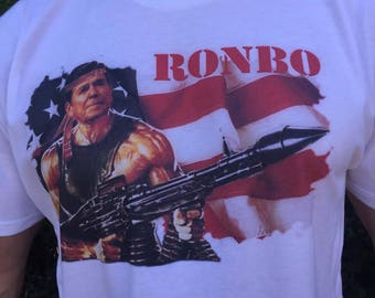 reagan riding velociraptor shirt