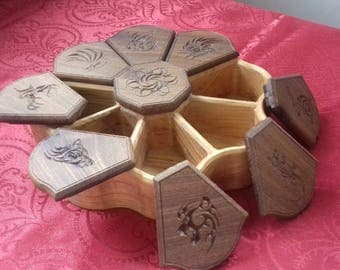 Wooden jewelry box decorated with engraved animals