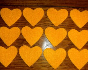 Set of twelve hearts yellow felt