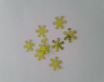Green snowflake confetti