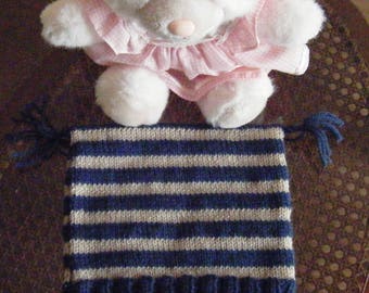 striped hat and his blue tassels