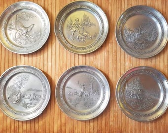 A Collection Set of Six Original Vintage German Pewter Wall Plates, Hunter Wood Nature Theme, 95% Zinn, HTM Pewter, Handmade, Angel Mark