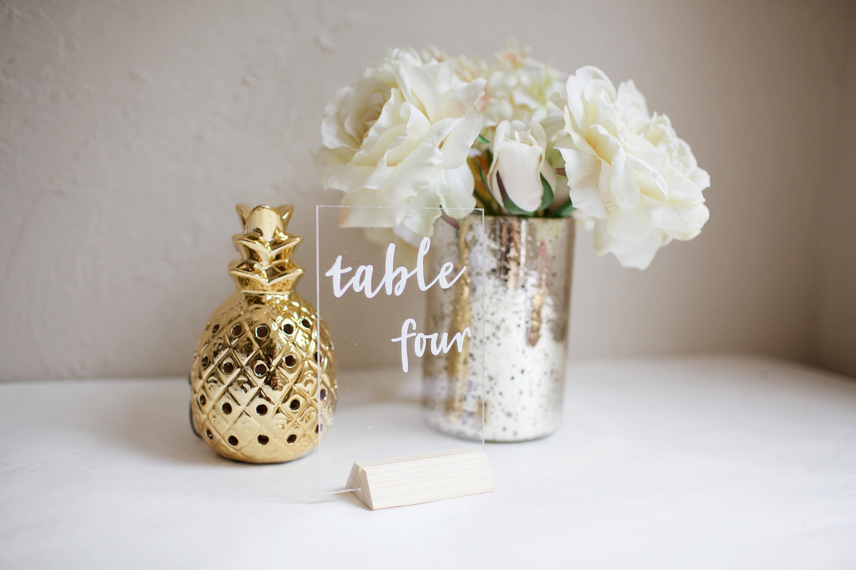 Acrylic table numbers or names. Size 4 x 6". Clear plexiglass. Custom designed for your unique wedding style. Any font or style