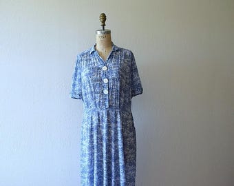 1940s dress . blue and white fern print dress