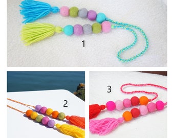 TC-03 TASSEL CHARM