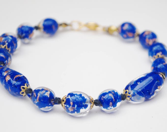 Italian Glass bead bracelet - Venetian clear and blue beads - gold sparkle - hand knotted - Art Glass