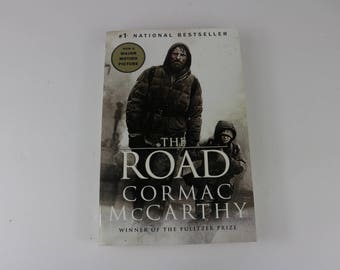 the journey in the road by cormac mccarthy 03-06-2009 best answer: first give an introduction the road is a 2006 novel by american writer cormac mccarthy it is a post-apocalyptic tale of a journey taken by a father and his young son over a period of several months, across a landscape blasted by an unnamed cataclysm that destroyed all civilization and, apparently, most life on earth. the journey in the road by cormac mccarthy 03-06-2009 best answer: first give an introduction the road is a 2006 novel by american writer cormac mccarthy it is a post-apocalyptic tale of a journey taken by a father and his young son over a period of several months, across a landscape blasted by an unnamed cataclysm that destroyed all civilization and, apparently, most life on earth.