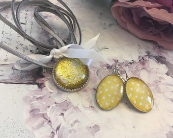 yellow and white polka-dot dress