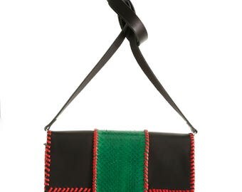 Detail green snake skin bag.