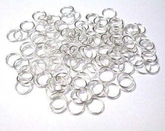 50 7mm silver jump rings