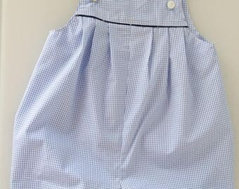 Adjustable romp with buttons