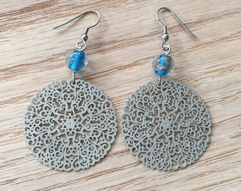 Handmade earrings with glass bead accent