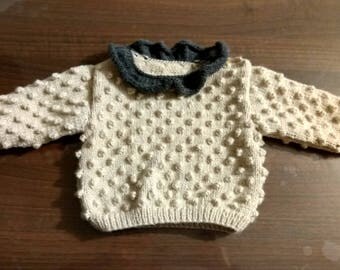two-tone beige and grey sweater