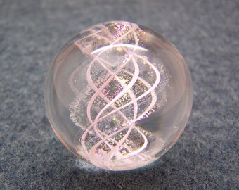 Clear dreamy lampwork glass marble with double helix of pink gold sparkles and white ribbons suspended inside, flamework glass art marble