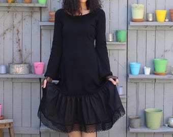Morgan Black jersey dress and lace Bell sleeves