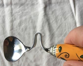 Bent bow curve spoon colorful ceramic? handle interesting kitchenware vintage gift idea stainless steel?