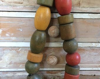 Vintage Wooden Toy Bead String...Old. Colors. Red. Green. Yellow. Blue.
