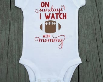 On Sundays we watch football with mommy