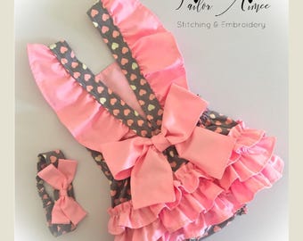 Baby girl bubble romper in bubblegum pink hearts ruffles