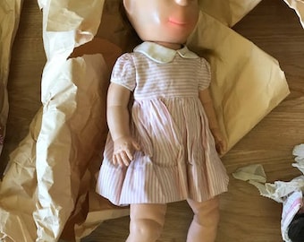 Poor pitiful pearl doll in good condition