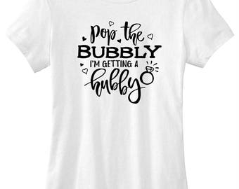 Pop the bubbly I'm getting a hubby t-shirt available in size s, med, large, and Xl for women funny womens graphic tee