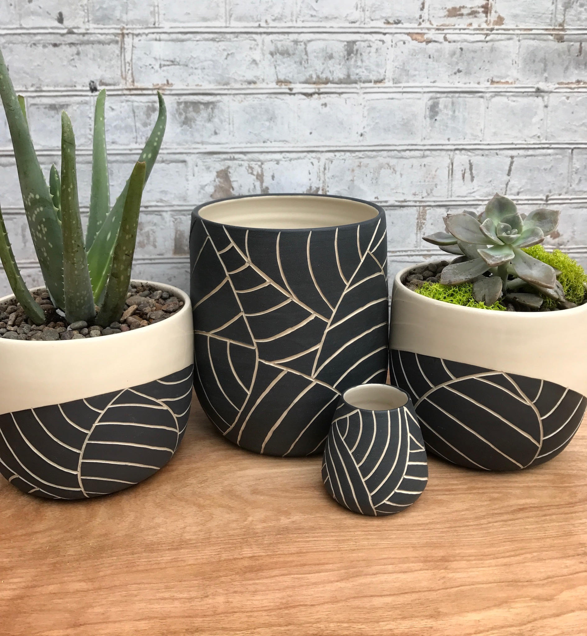 Mid size black and white carved planter