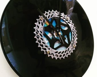Wall clock made with an old bike cassette and a vinyl record