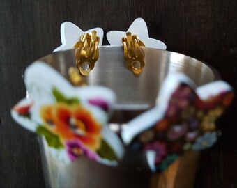 Buttons. Fleurs étoilées, pince métal doré