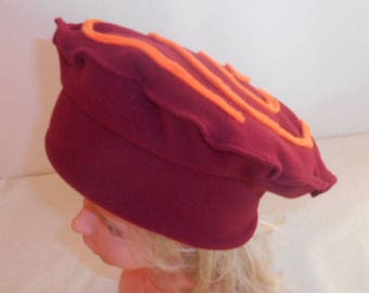 Hat girl all fleece red and orange spiral pattern